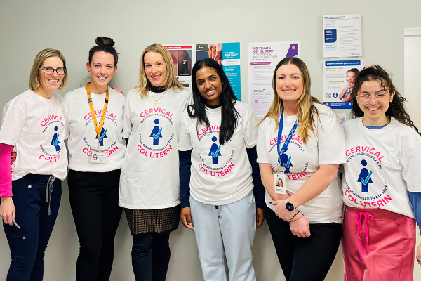 6 women in Cervical Health Awareness Month t-shirts standing in a clinic